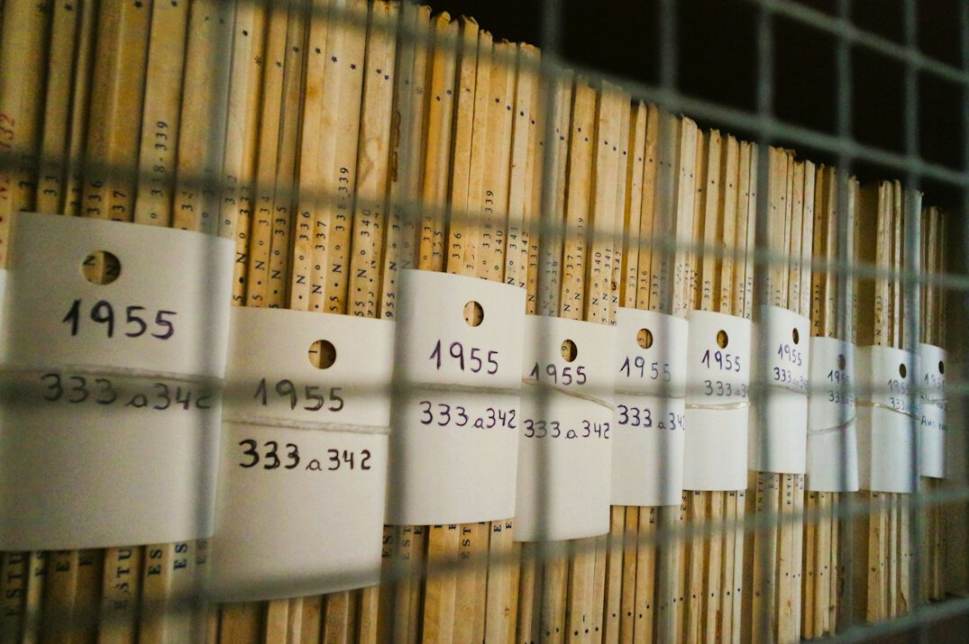 detective reading case files